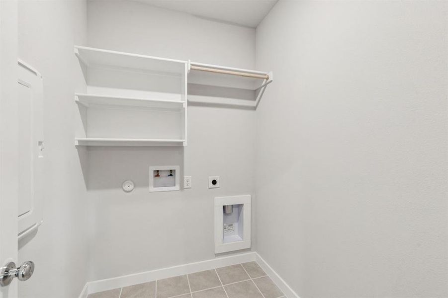 Utility Room in the Oscar home plan by Trophy Signature Homes – REPRESENTATIVE PHOTO