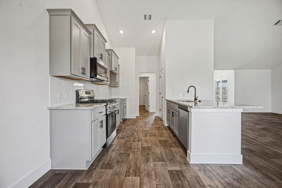 Furnished interior view inside a new home in Greystone, Angleton (Image 3).