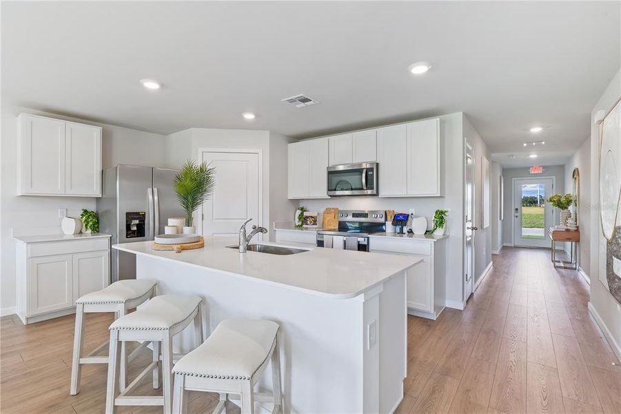 Furnished interior view inside a new home in Central Parc, North Port (Image 13).