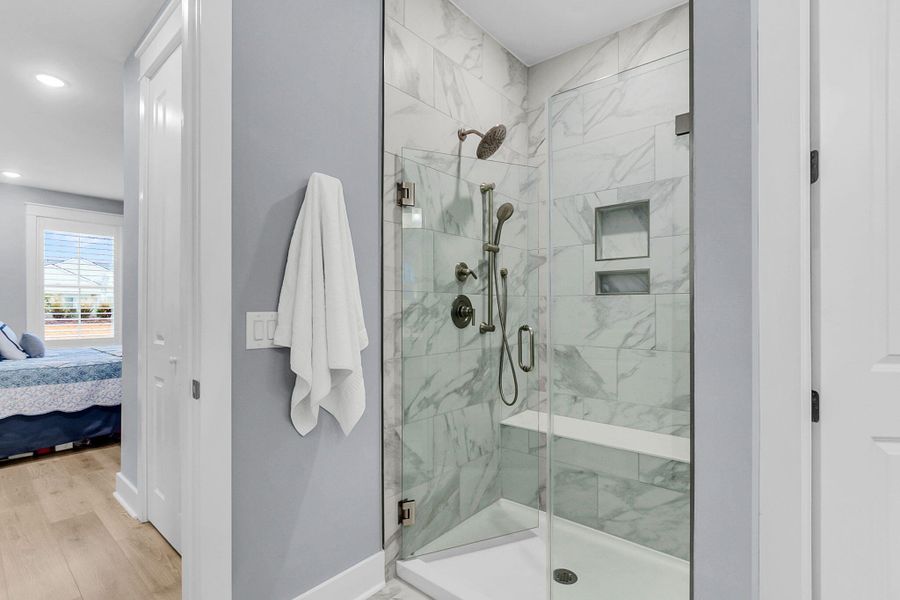 Furnished interior view inside a new home in K. Hovnanian's® Four Seasons at Lakes of Cane Bay, Summerville (Image 34).