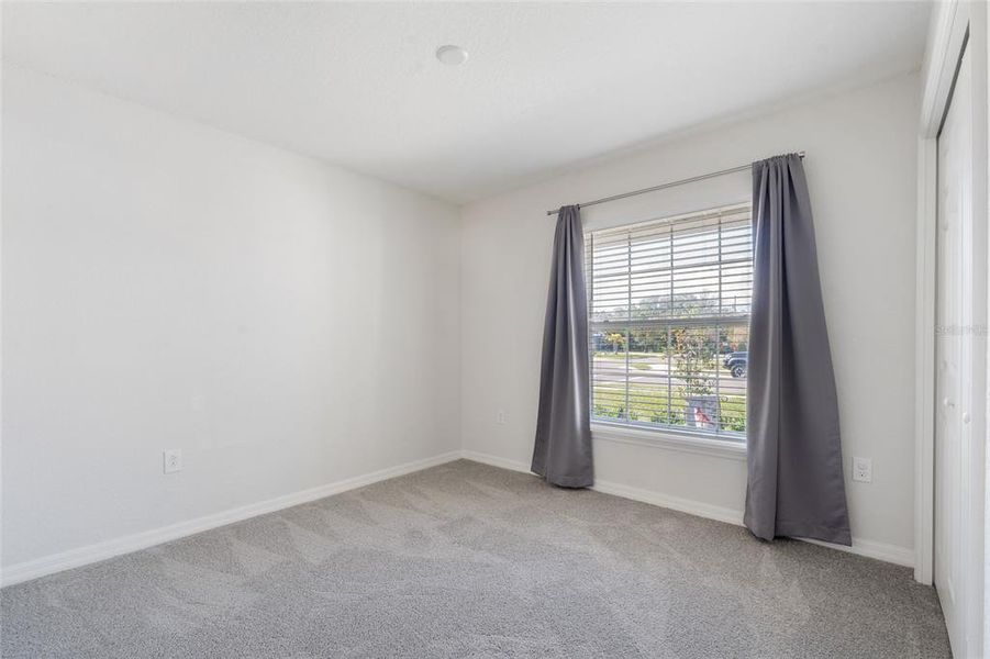 Spacious, unfurnished interior of a new home in Aviary at Rutland Ranch, Parrish (Image 21).