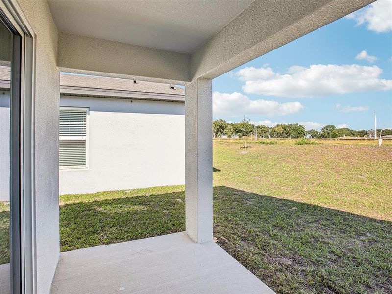 Exterior details and patio area of a home in Trilby Crossing, Brooksville (Image 3).
