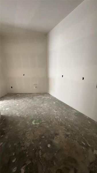 Oversized utility room that connects to primary closet. Oversized utility room that connects to primary closet.