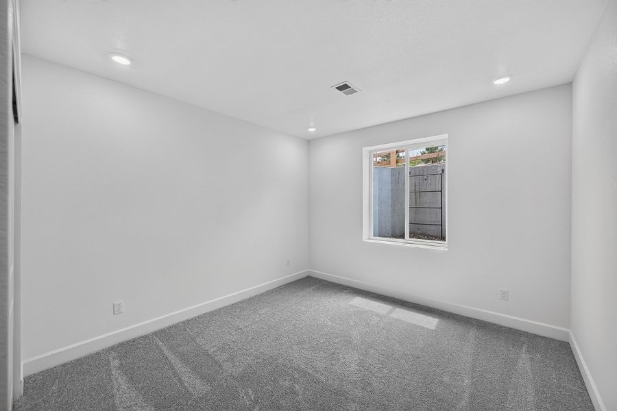 Spacious, unfurnished interior of a new home in Trailstone, Arvada (Image 22).