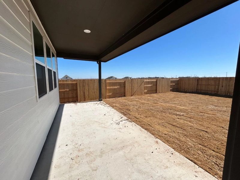 Exterior details and patio area of a home in Willow Springs, Buda (Image 3).