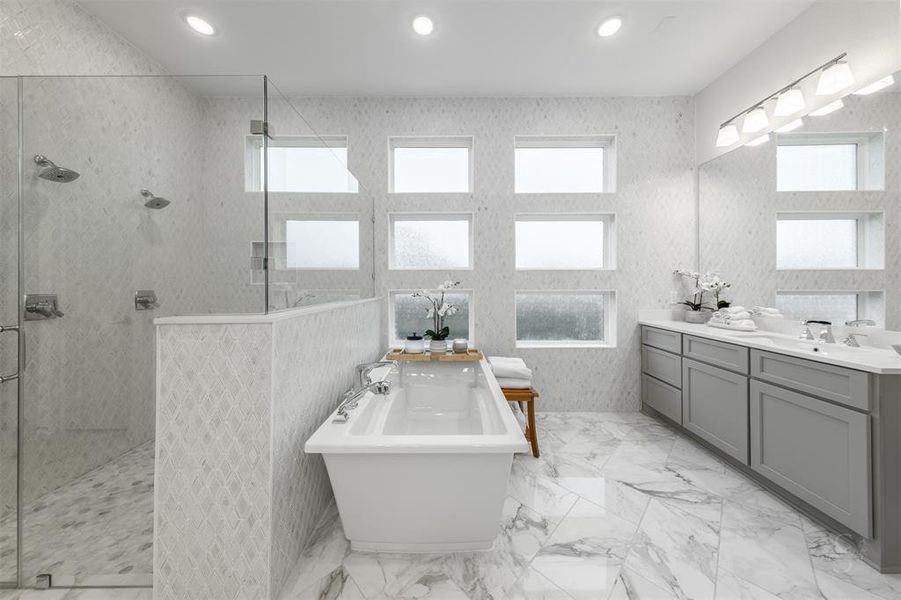 The Primary Bathroom simply exudes luxury as a spa like sanctuary.