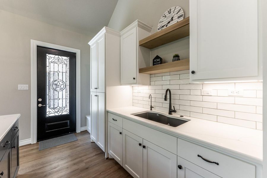 Furnished interior view inside a new home in , New Waverly (Image 16).