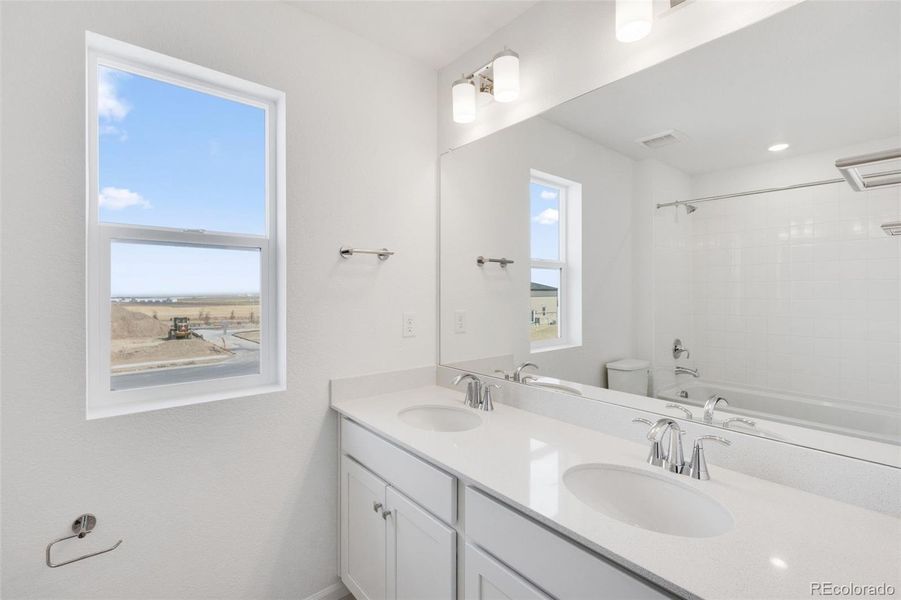 Furnished interior view inside a new home in The Casitas Collection at Windler, Aurora (Image 9). Furnished interior view inside a new home in The Casitas Collection at Windler, Aurora (Image 9).