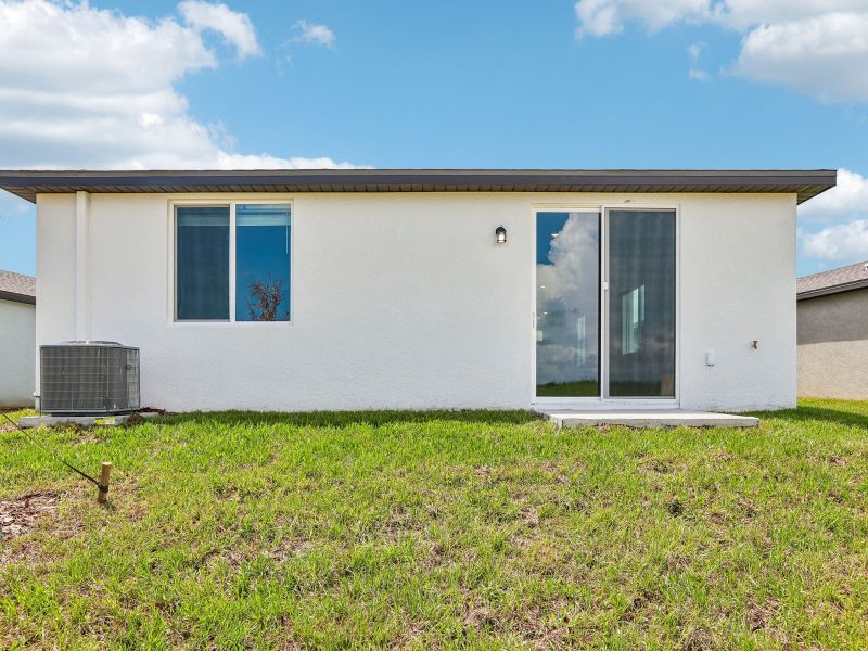 Exterior details and patio area of a home in Benton Hills - Premier Series, Brooksville (Image 3).