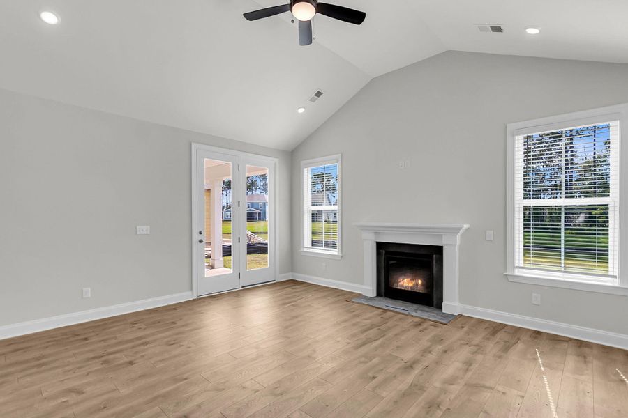Spacious, unfurnished interior of a new home in Tidewater at Lakes of Cane Bay, Summerville (Image 28).