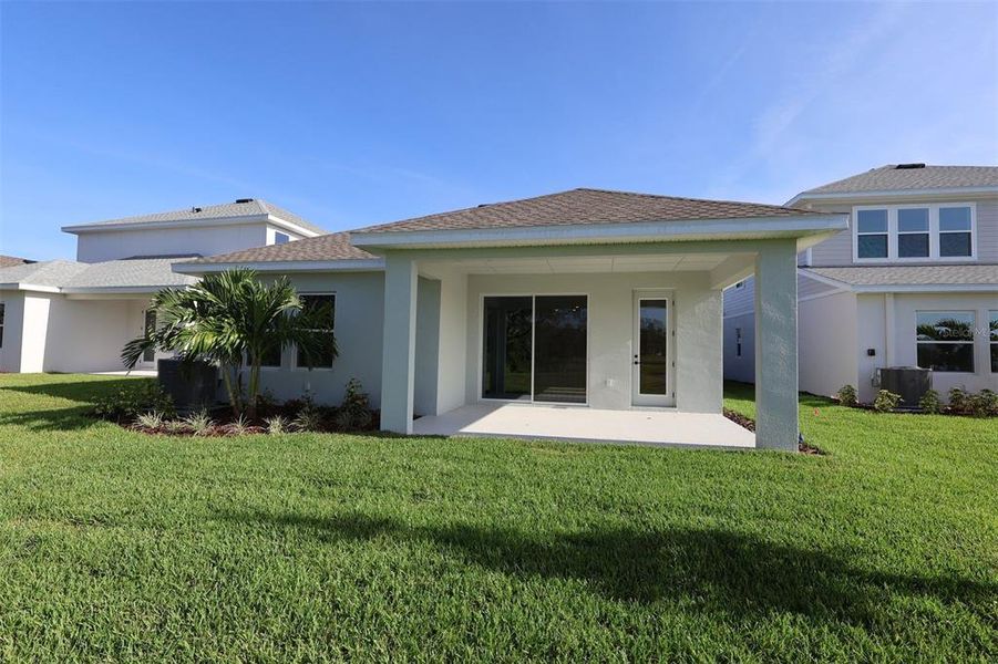 Front exterior of a new home in North River Ranch – Garden Series, Parrish, FL, highlighting curb appeal (Image 25).