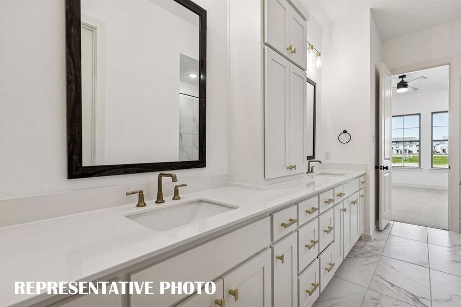 You'll enjoy ample room for two in this lovely owner's bath!  REPRESENTATIVE PHOTO