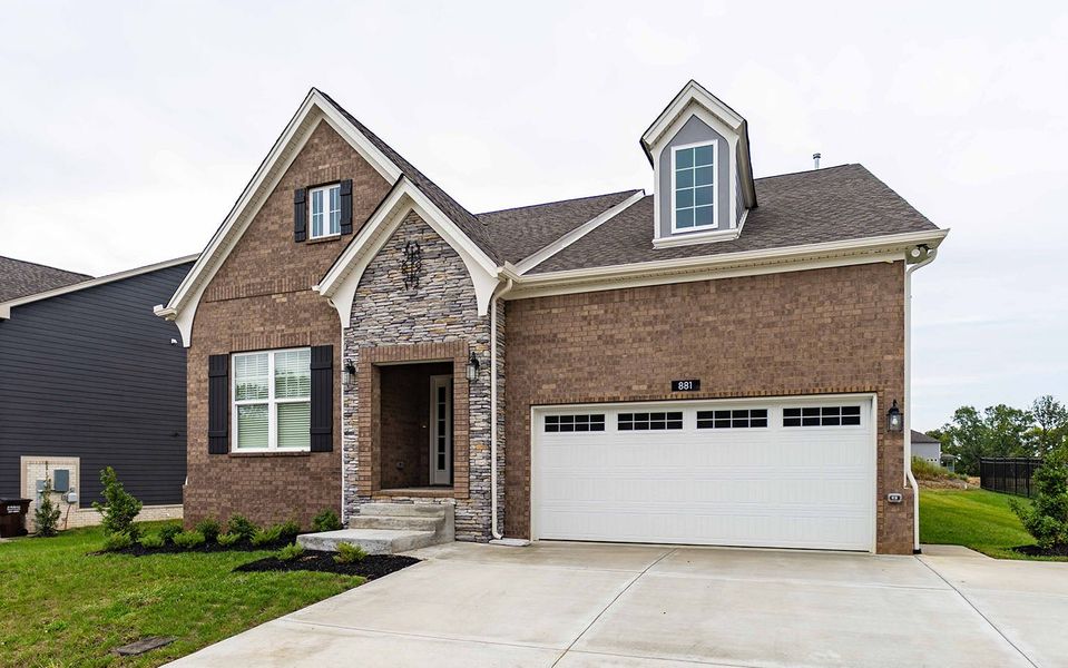 Front exterior of a new home in The Retreat at Norman Farm, Hendersonville, TN, highlighting curb appeal (Image 2). Front exterior of a new home in The Retreat at Norman Farm, Hendersonville, TN, highlighting curb appeal (Image 2).