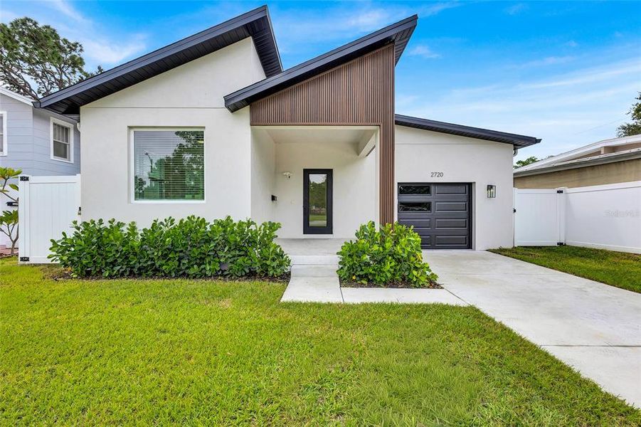 Front exterior of a new home in , St. Petersburg, FL, highlighting curb appeal (Image 15). Front exterior of a new home in , St. Petersburg, FL, highlighting curb appeal (Image 15).