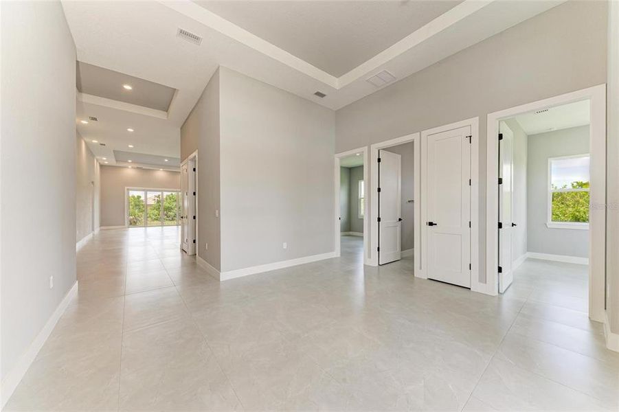 Spacious, unfurnished interior of a new home in , Port Charlotte (Image 25).