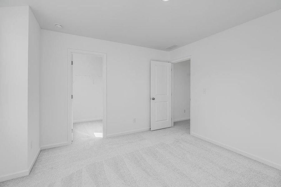 Spacious, unfurnished interior of a new home in Windance Lake, Loganville (Image 37).