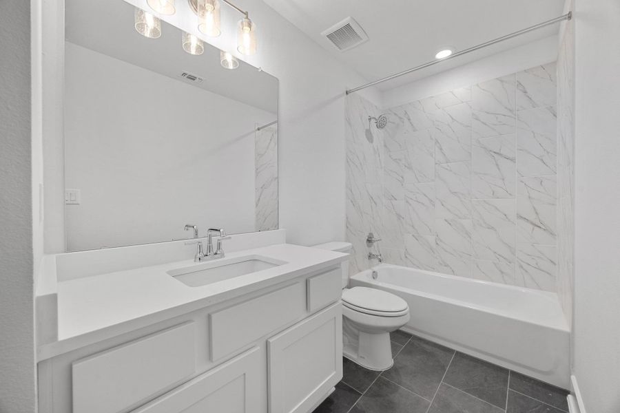 Furnished interior view inside a new home in Parmer Ranch - 60', Georgetown (Image 11).