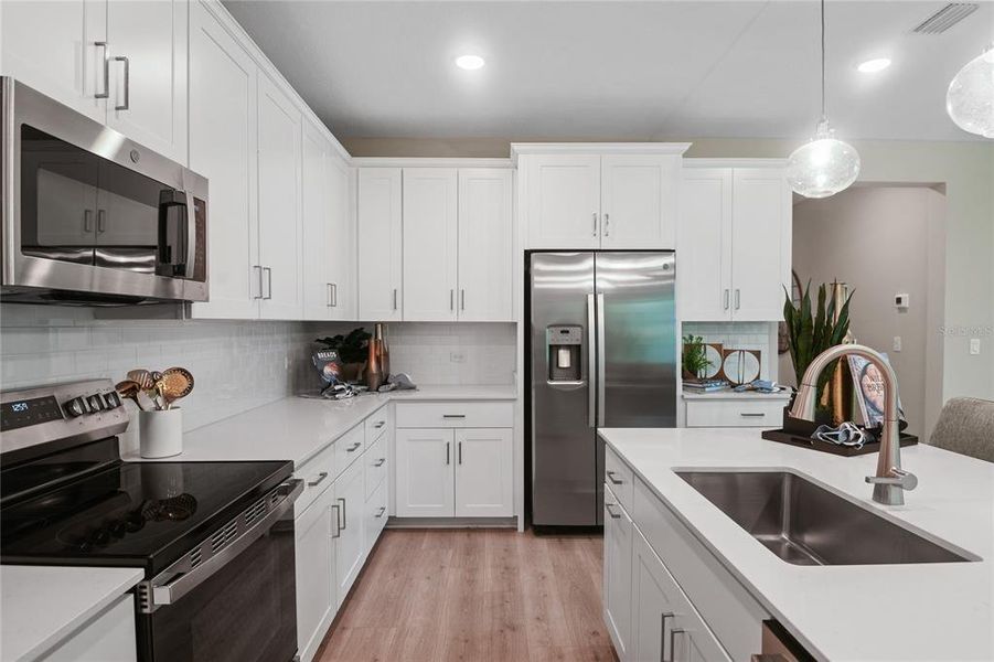Furnished interior view inside a new home in SummerTide, Palm Coast (Image 7).