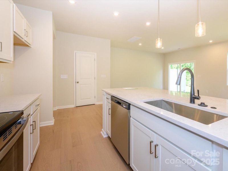 Plenty of kitchen storage, not pictured: walk-in pantry. Plenty of kitchen storage, not pictured: walk-in pantry.