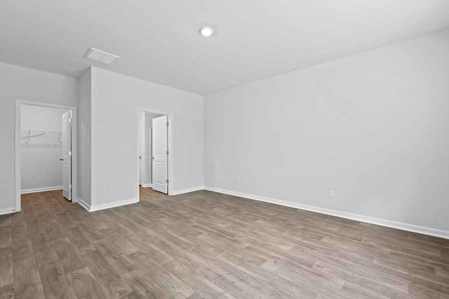 Spacious, unfurnished interior of a new home in Pine Hills at Cane Bay, Summerville (Image 21).