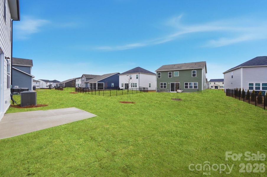 Exterior details and patio area of a home in Waxhaw Landing, Monroe (Image 3).