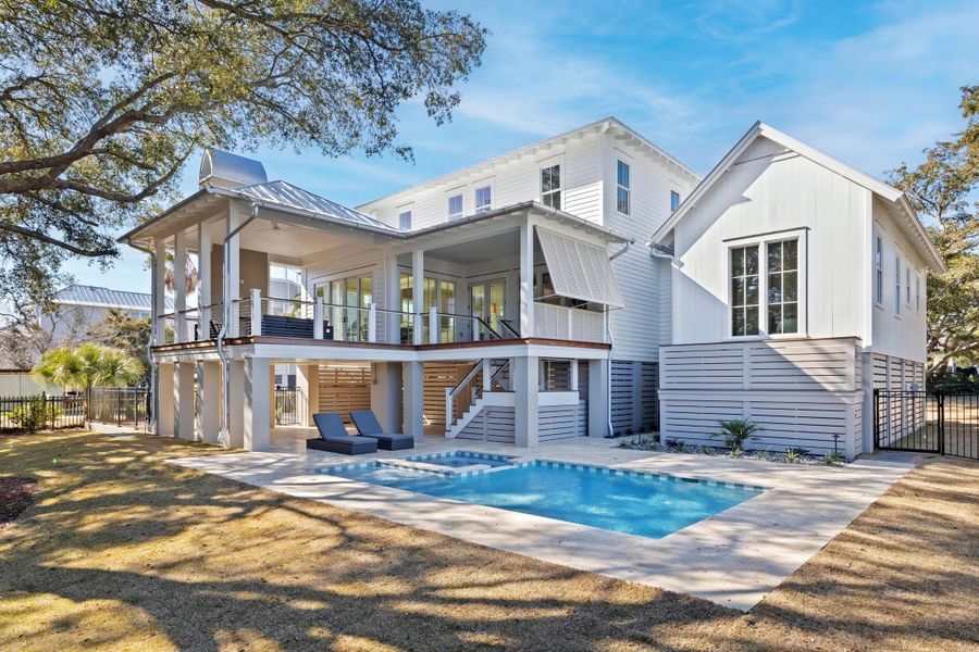 Exterior details and patio area of a home in , Sullivan's Island (Image 38).