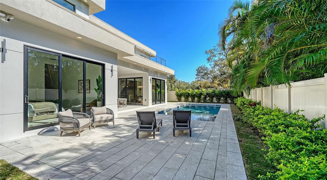 Exterior details and patio area of a home in , Sarasota (Image 26).
