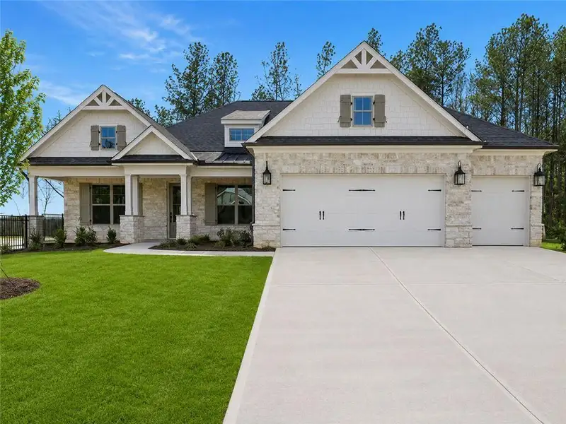 Front exterior of a new home in Soleil Belmont Park, Canton, GA, highlighting curb appeal (Image 1). Front exterior of a new home in Soleil Belmont Park, Canton, GA, highlighting curb appeal (Image 1).