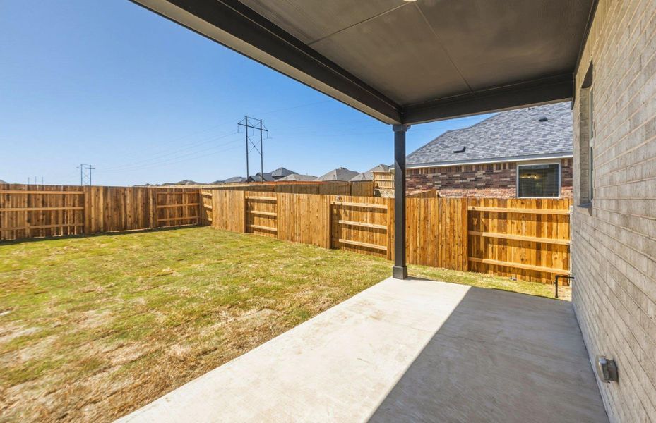Exterior details and patio area of a home in Sunfield, Buda (Image 26).