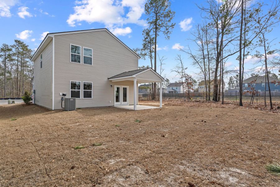 Exterior details and patio area of a home in Grand Arbor, Blythewood (Image 4).