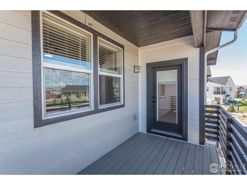 Exterior details and patio area of a home in Raindance Condos, Windsor (Image 30).