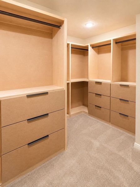 These custom built drawers, hanging racks and shoes closet is what everyone needs.