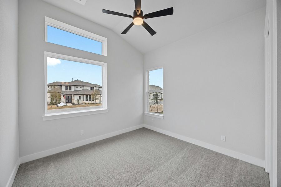 Spacious, unfurnished interior of a new home in Caliterra, Dripping Springs (Image 28).