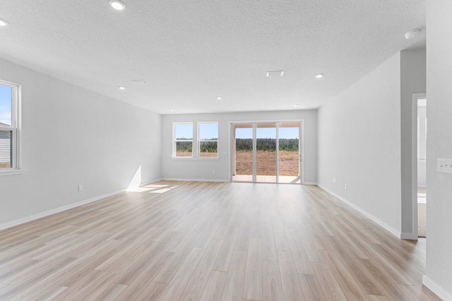 Lot 595 Open Great Room with Sliding Doors to Covered Patio at NorthShore