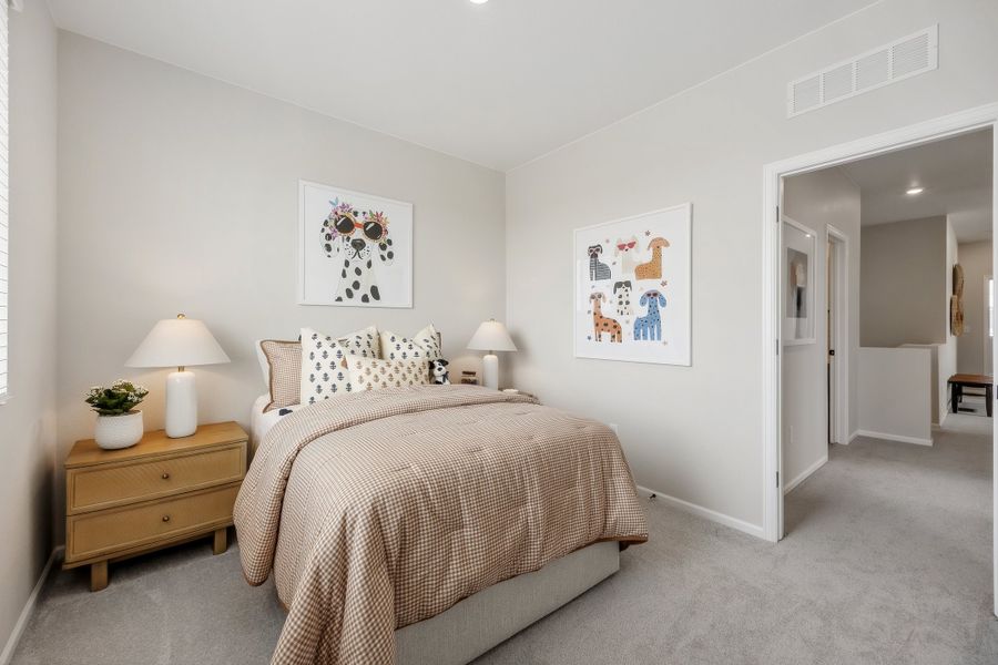Representative furnished interior of a home built from the 2503 by Risewell Homes in Harvest Crossing, Aurora (Image 27).