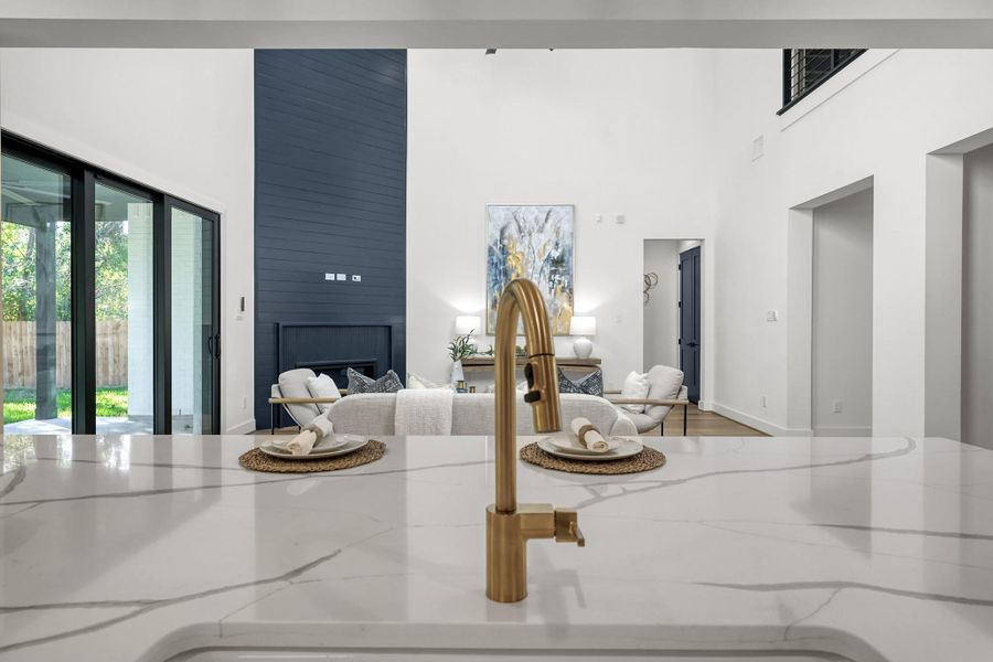 Transition area between living and stairway with elegant sightlines. Transition area between living and stairway with elegant sightlines.