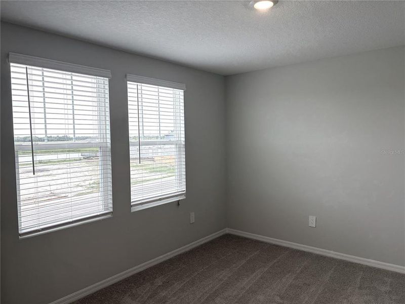 Spacious, unfurnished interior of a new home in Oakfield Trails, Parrish (Image 31).