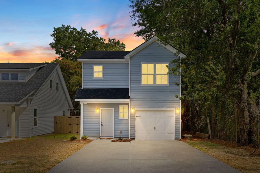Front exterior of a new home in , North Charleston, SC, highlighting curb appeal (Image 27).