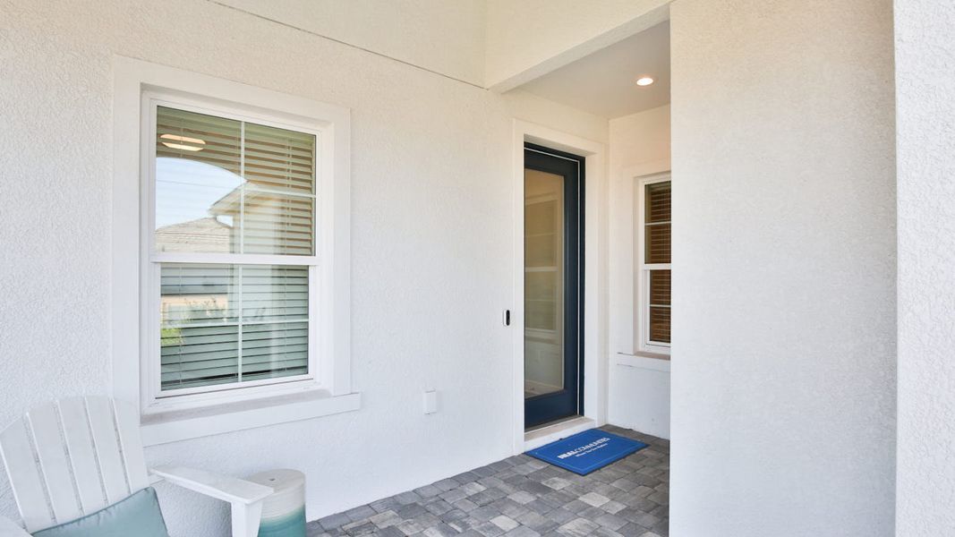 Exterior details and patio area of a home in Palm Grove Real Estate and Homes for Sale in Lakewood Ranch, FL - Neal Communities, Lakewood Ranch (Image 28).