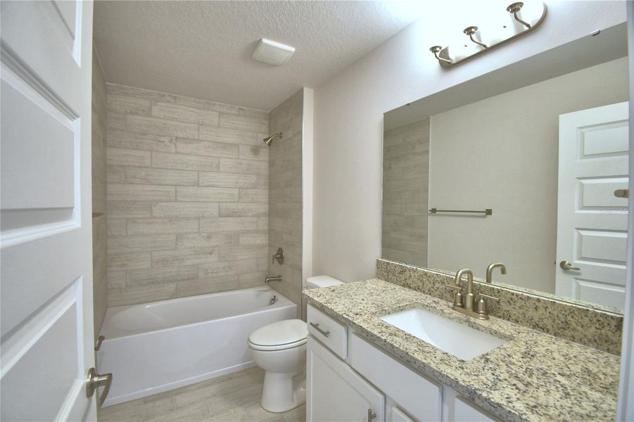 Furnished interior view inside a new home in Lake Juliana Estates, Auburndale (Image 11).