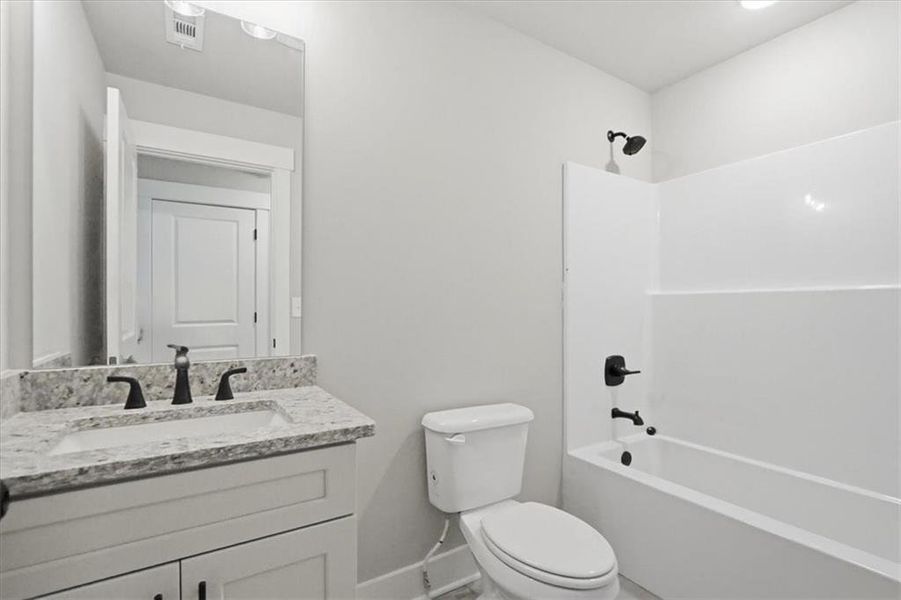 Furnished interior view inside a new home in , Statham (Image 17).