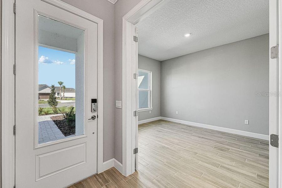 Spacious, unfurnished interior of a new home in Esplanade at Center Lake Ranch, St. Cloud (Image 21).