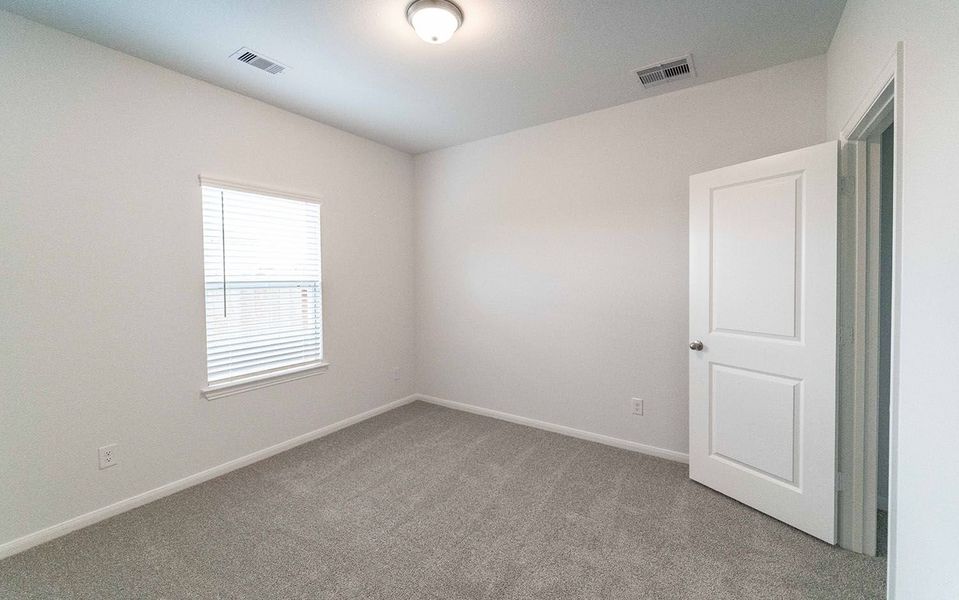 Spacious, unfurnished interior of a new home in Windrose Green, Angleton (Image 12).