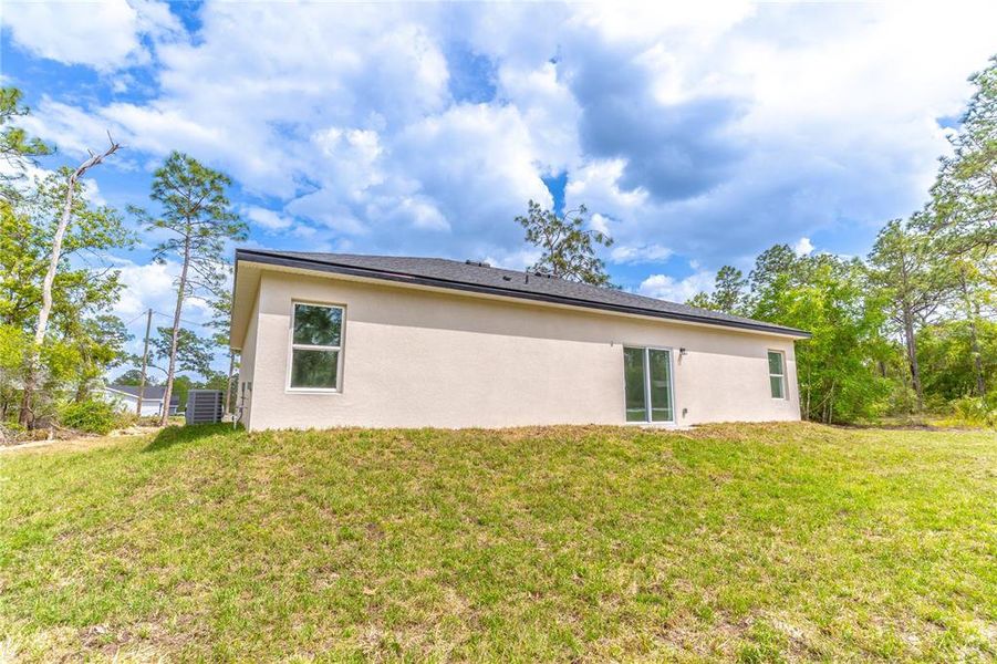 Front exterior of a new home in , Ocala, FL, highlighting curb appeal (Image 2).
