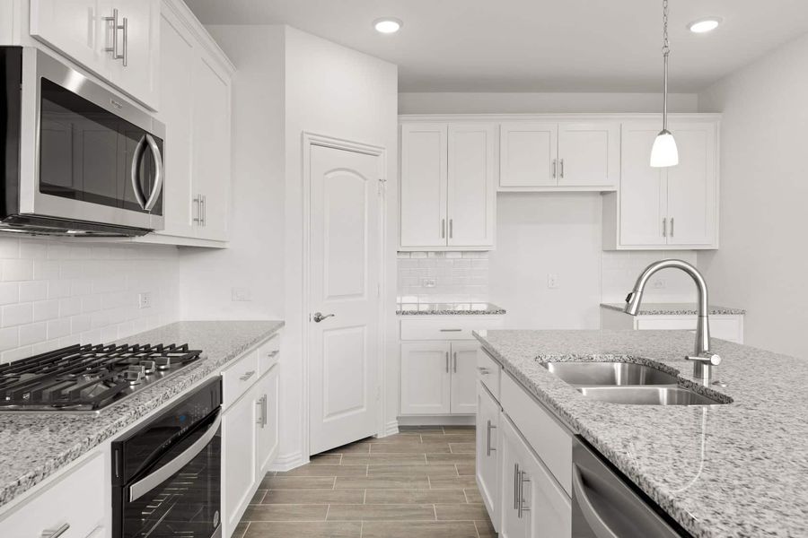 Representative furnished interior of a home built from the Blackburn by UnionMain Homes in Reunion, Rhome (Image 8).