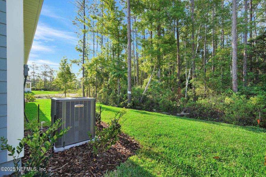 Front exterior of a new home in Trailmark - Phase 10, St. Augustine, FL, highlighting curb appeal (Image 18).