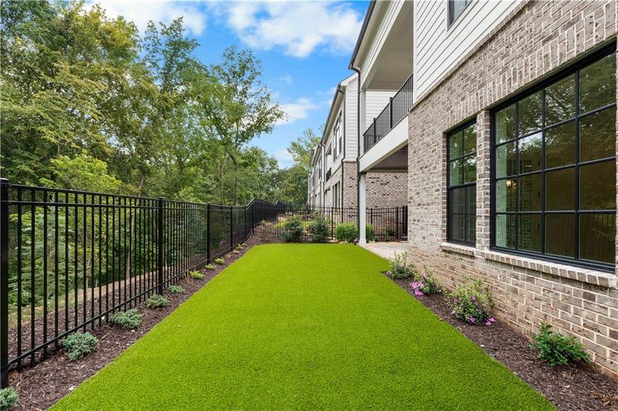 Exterior details and patio area of a home in Waterside Single Family, Peachtree Corners (Image 31). Exterior details and patio area of a home in Waterside Single Family, Peachtree Corners (Image 31).