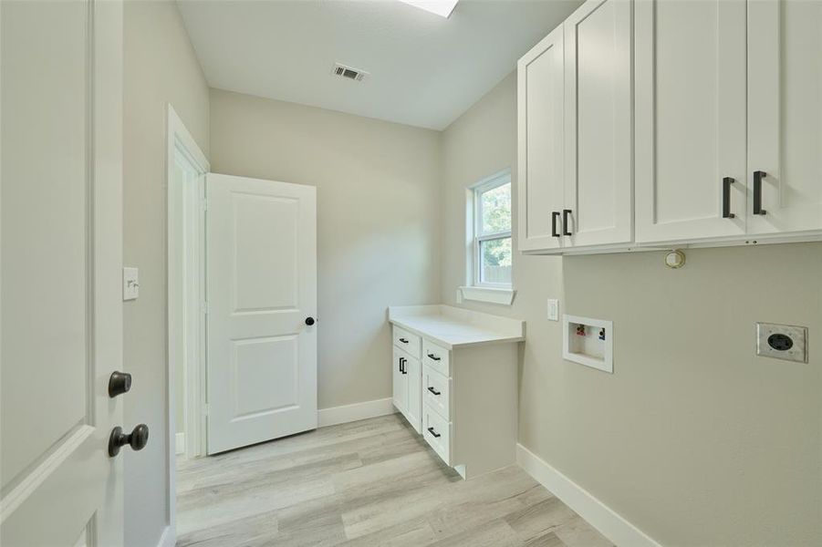 Laundry room.   All electric home.