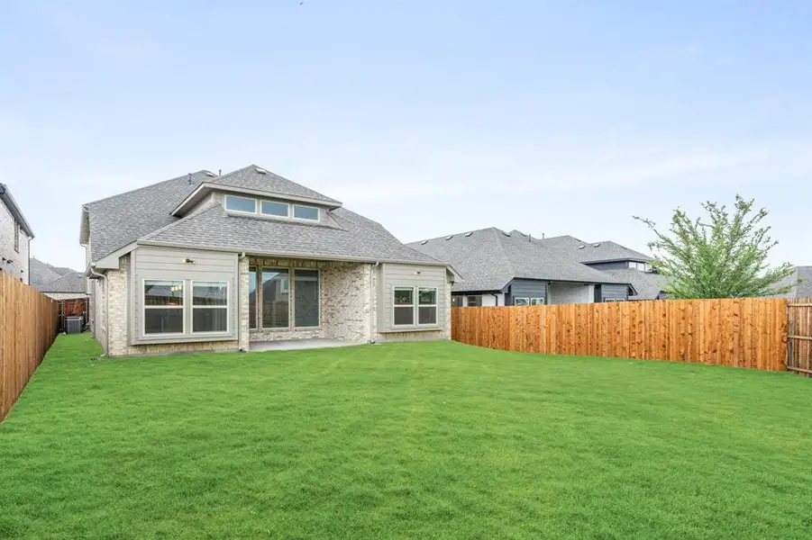 Exterior details and patio area of a home in Willow Wood, McKinney (Image 27).