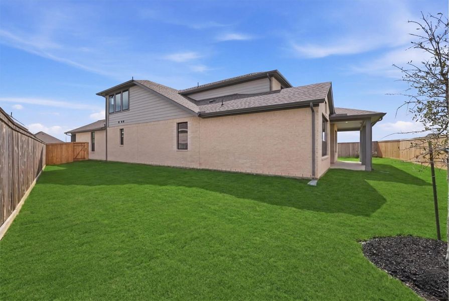 Exterior details and patio area of a home in Bridgeland, Cypress (Image 3).